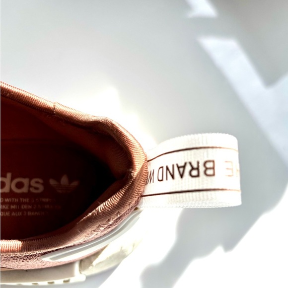 Adidas NMD_R1 shoes, specifically identified in the "Raw Pink" or "Salmon - Picture 12 of 16
